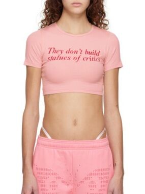 They Don't Build Statues of Critics Pink Crop Top from Praying